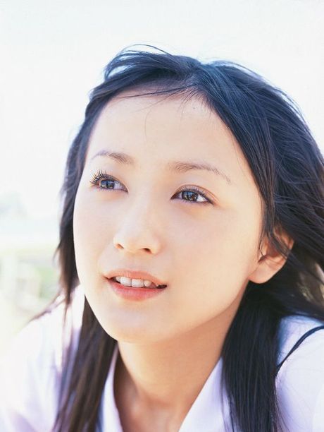 Delicious petite gravure idol wearing red bikini bottoms