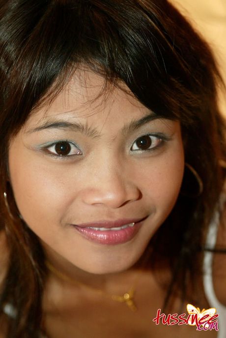 Innocent Asian nubile in cute underwear plays in bed