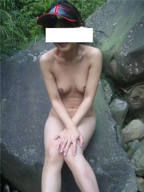 Asian amateur girl with small tits strips and shows her hot ass outdoors